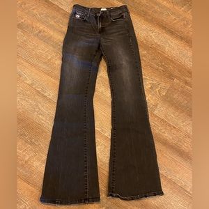 Sneak Peek black flare jeans.